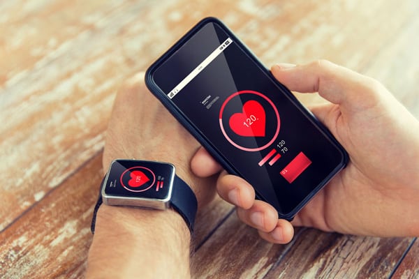 An app compatible with smartwatch and smart phone that tracks heart rate