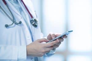 medical doctor using telemedicine app