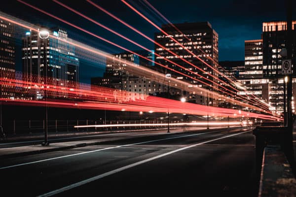 A photo of a city street taken with long exposure