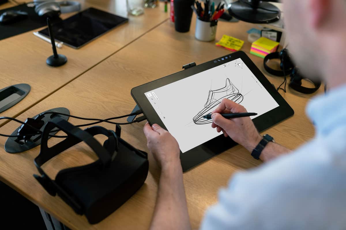 Man designing a prototype on his drawing tablet